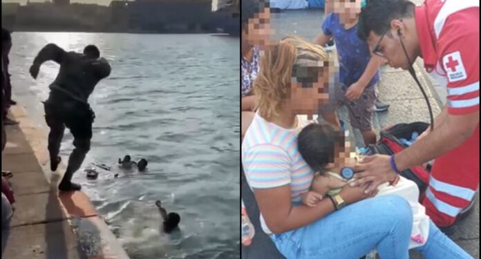 VIDEO: Policías rescatan a bebé que cayó al mar en su carriola en Veracruz | El Universal